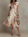 Printed V-neck Defined Waistline Ruffled Hem Dress
